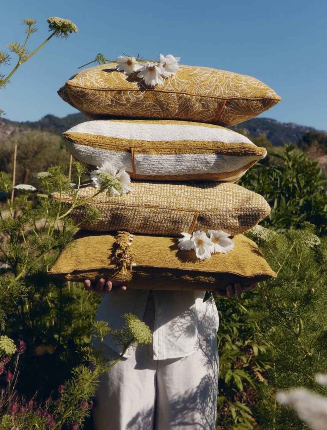 Ochre cushions in a garden